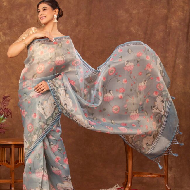 Full-length photo of navy blue georgette saree with sequin work